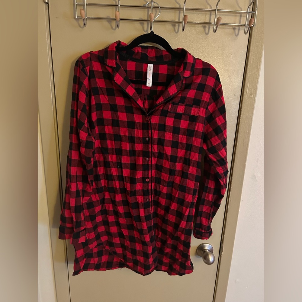 Red Checkered flannel shirt.